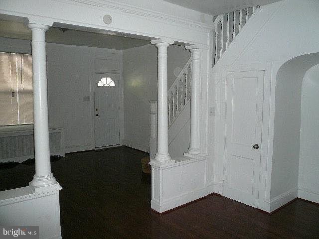 foyer entrance with ornate columns