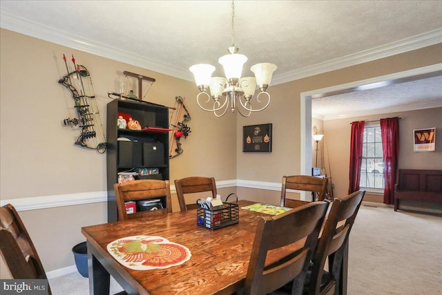 carpeted dining room featuring crown molding, a textured ceiling, and an inviting chandelier