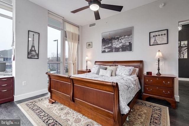 bedroom featuring dark wood-type flooring and ceiling fan