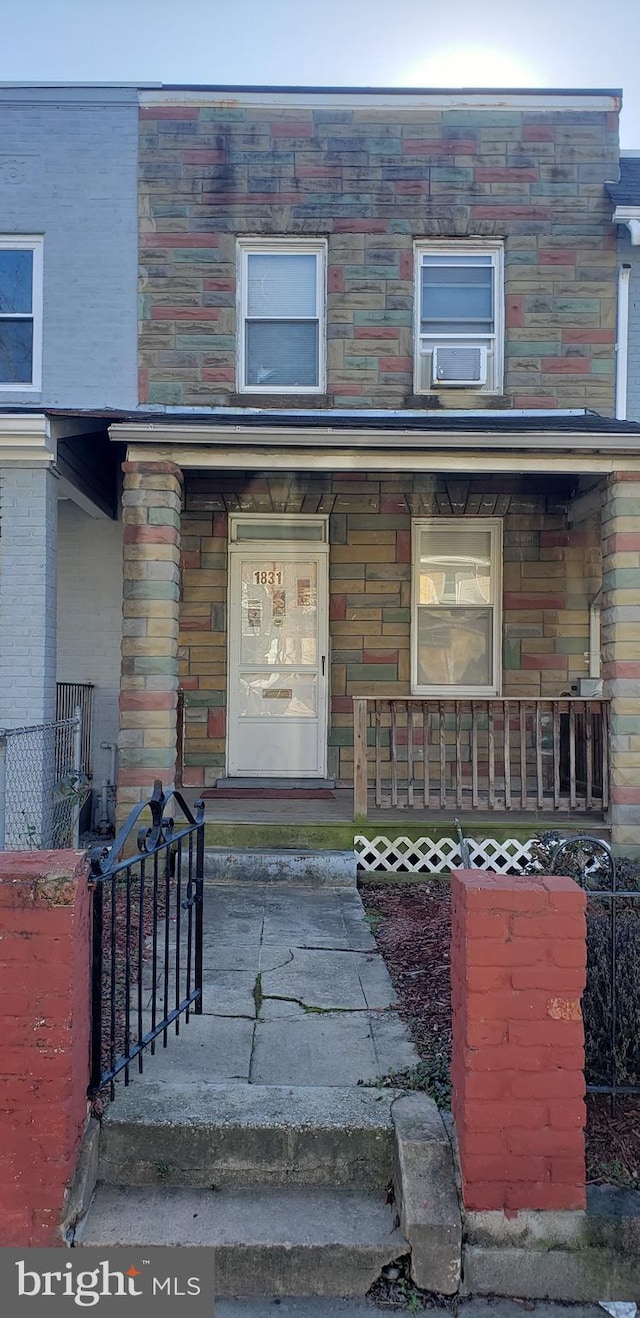 entrance to property with a porch