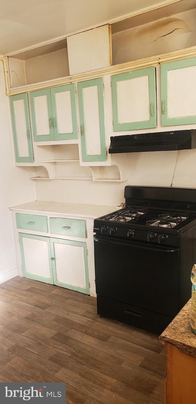 kitchen with dark wood-type flooring and black range with gas stovetop