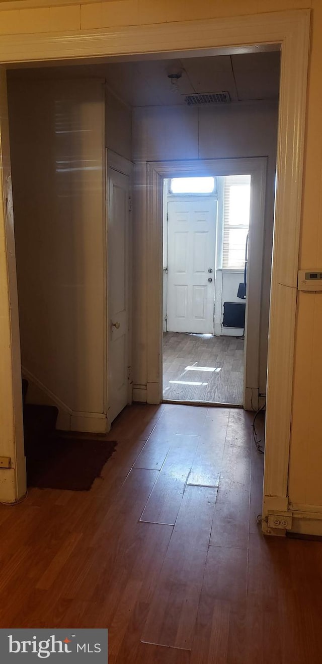 hallway with light wood-type flooring