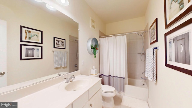 full bathroom with vanity, tile patterned flooring, toilet, and shower / bath combo with shower curtain