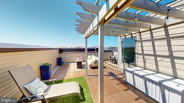 wooden deck featuring a pergola and outdoor lounge area