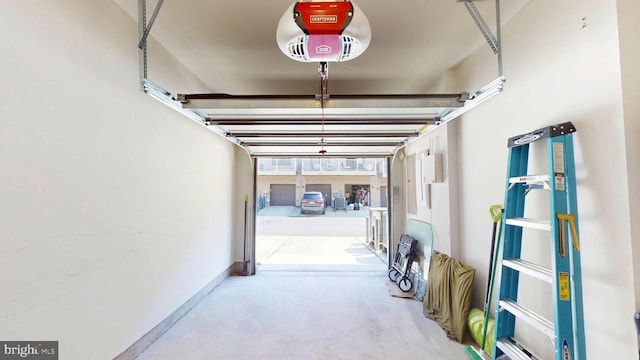 garage featuring a garage door opener