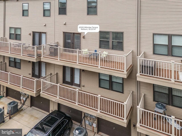 view of building exterior with central air condition unit