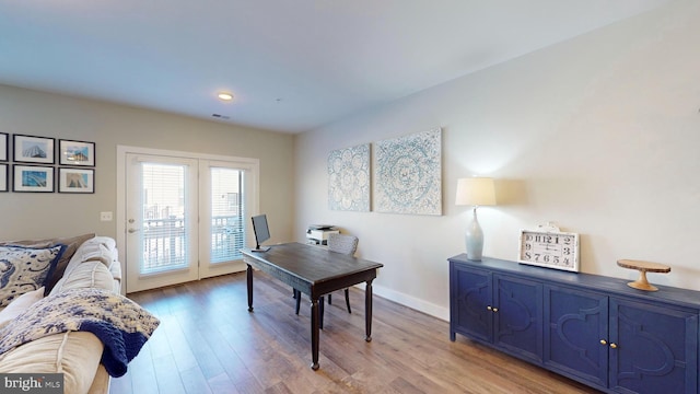 home office featuring hardwood / wood-style flooring