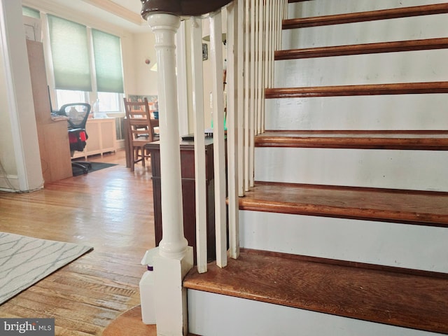 stairway featuring hardwood / wood-style floors