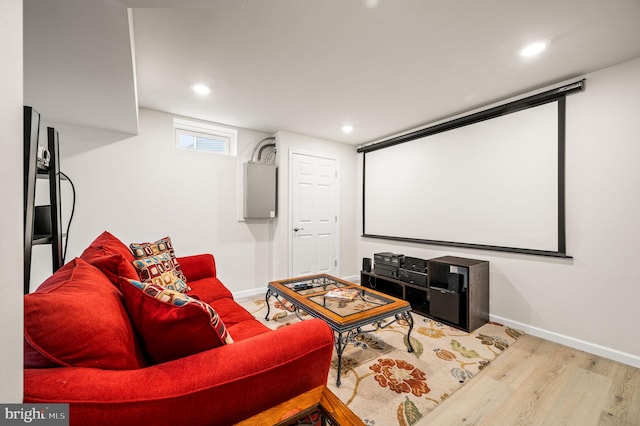 cinema featuring light hardwood / wood-style flooring