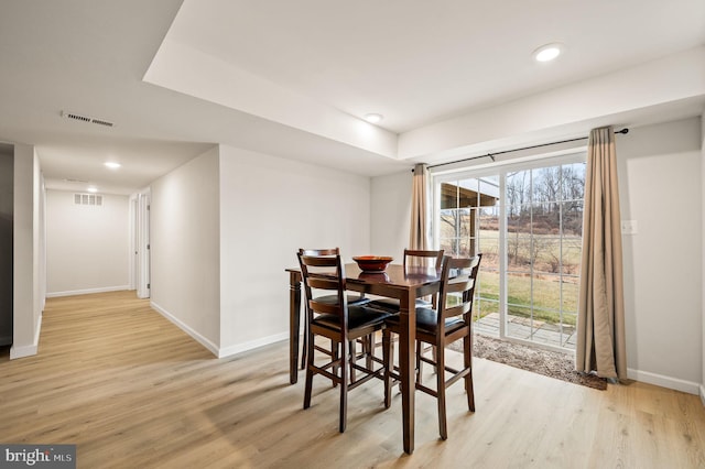 dining area featuring light hardwood / wood-style floors