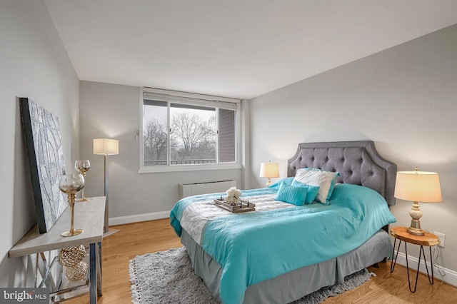 bedroom featuring light hardwood / wood-style floors