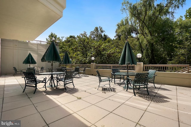 view of patio featuring outdoor dining space