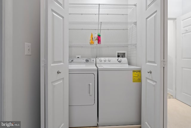 laundry area featuring laundry area and independent washer and dryer