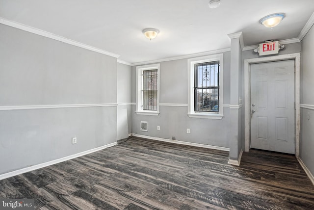 interior space with crown molding and dark wood-type flooring