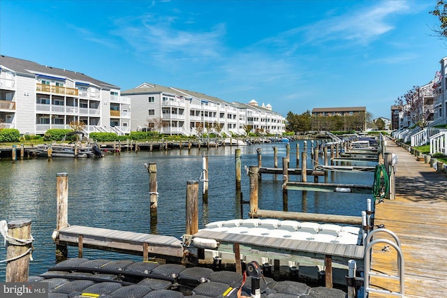 dock area with a water view