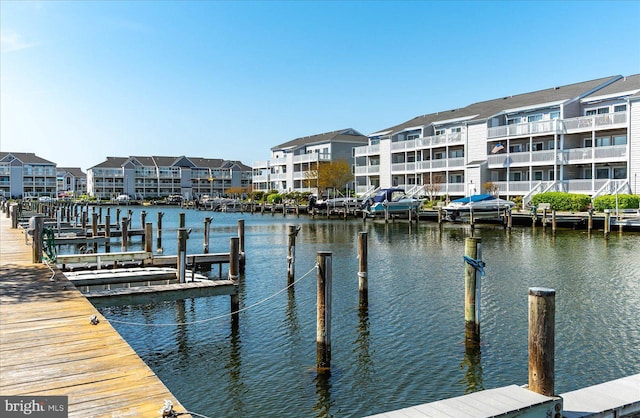 dock area featuring a water view