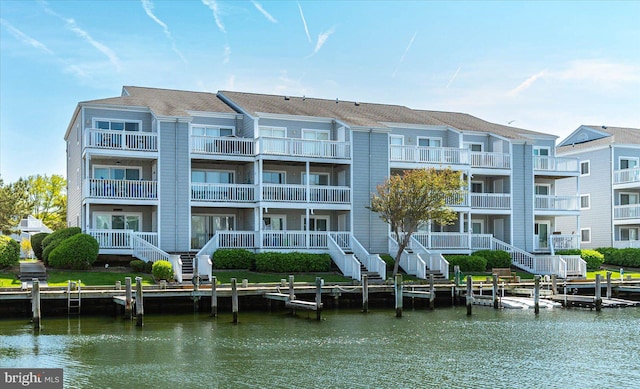 view of property with a water view