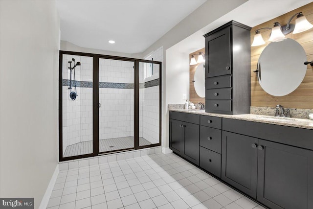 bathroom with vanity, tile patterned floors, and walk in shower