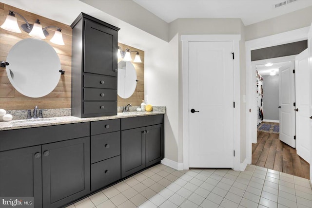 bathroom featuring vanity and tile patterned flooring