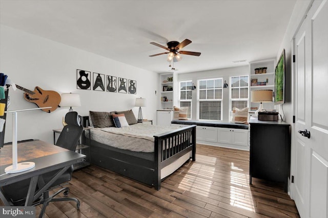 bedroom featuring dark wood-type flooring