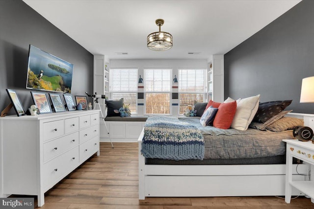 bedroom featuring hardwood / wood-style floors