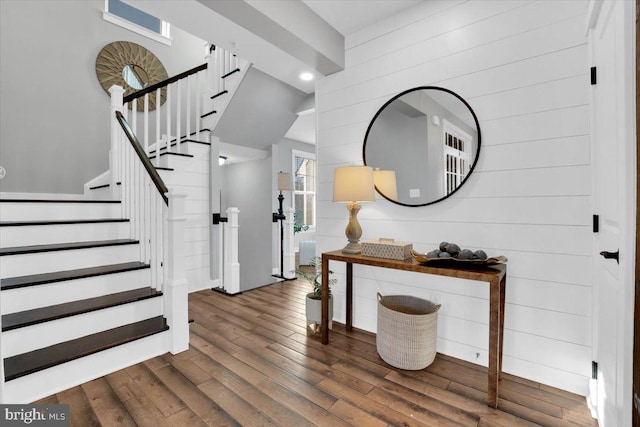 entrance foyer featuring dark hardwood / wood-style floors