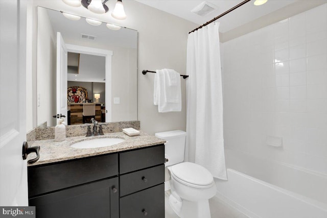 full bathroom with toilet, vanity, and shower / bathtub combination with curtain