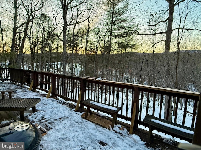 view of snow covered deck