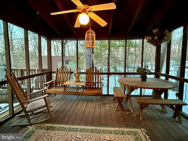 sunroom / solarium with ceiling fan