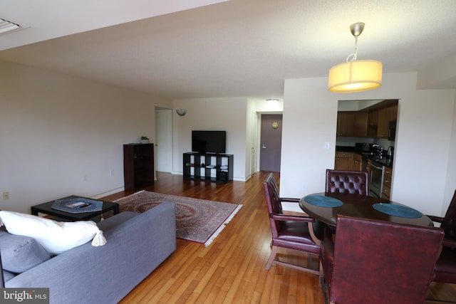 living room featuring light hardwood / wood-style floors