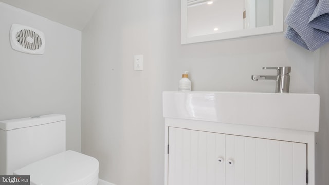 bathroom with sink and toilet