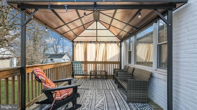 wooden deck with a gazebo