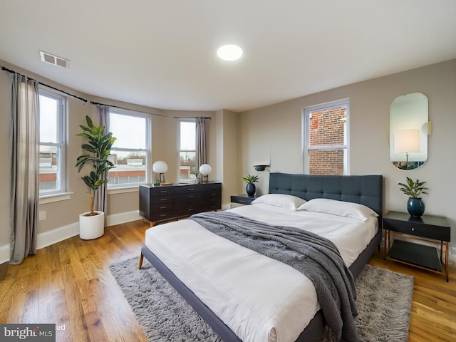 bedroom featuring light wood-type flooring