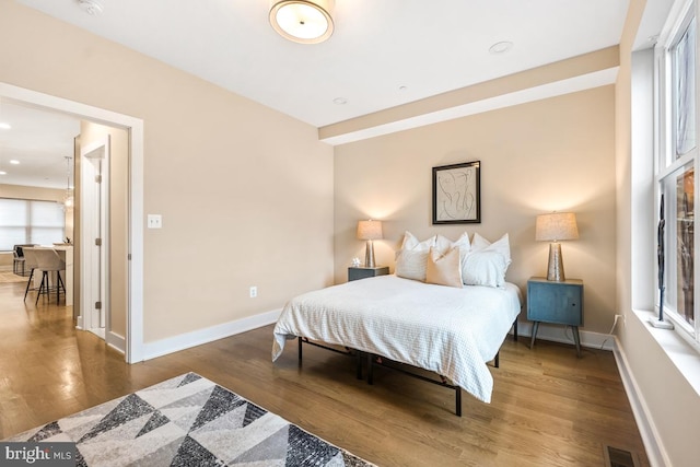 bedroom featuring dark hardwood / wood-style floors