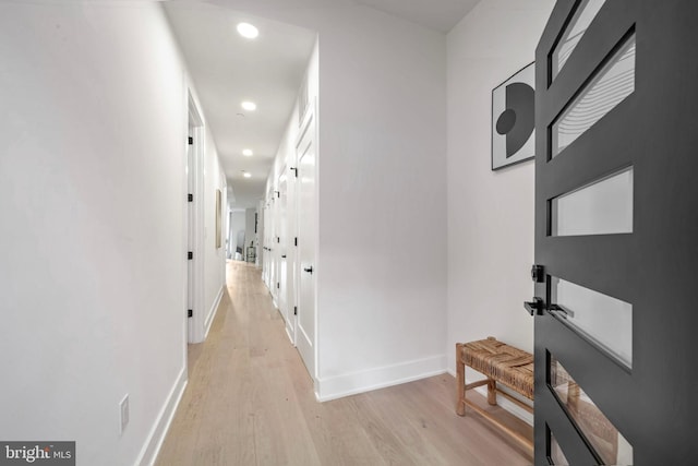 hallway featuring light wood-type flooring