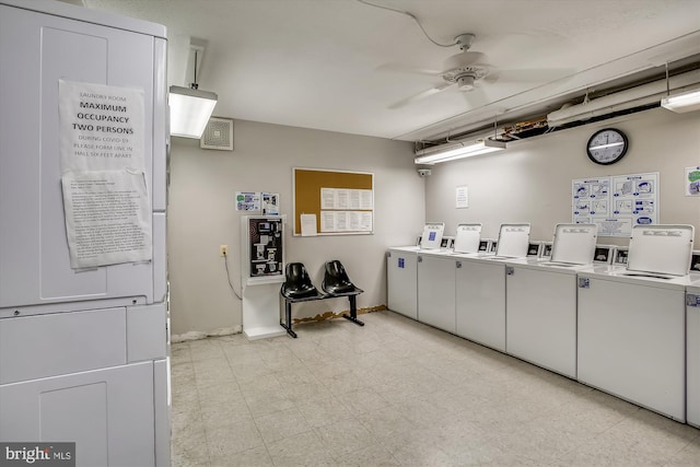 clothes washing area with washing machine and clothes dryer and ceiling fan