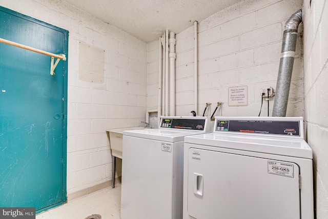 laundry area with washer and dryer