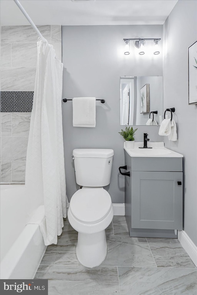 full bathroom featuring vanity, shower / bath combo, and toilet