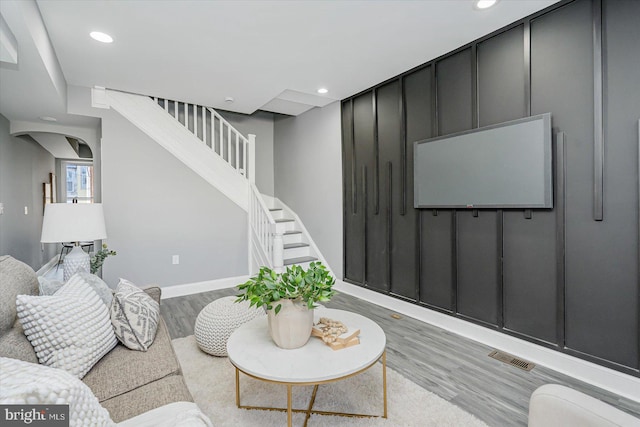 living room with hardwood / wood-style floors