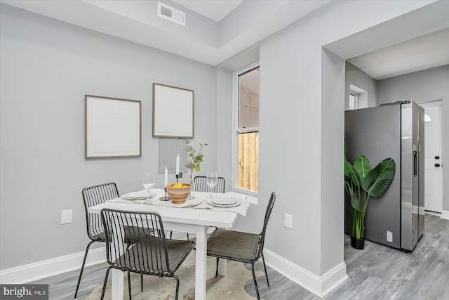 dining area featuring light hardwood / wood-style flooring