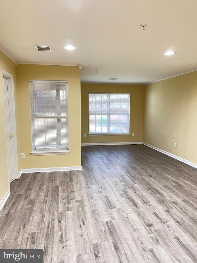 unfurnished living room with light wood-type flooring