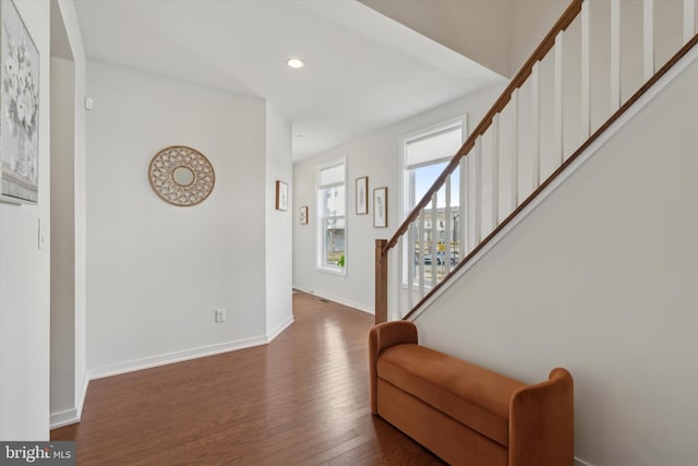 foyer entrance featuring dark hardwood / wood-style flooring