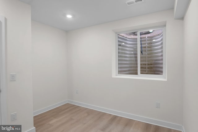 empty room featuring light hardwood / wood-style floors