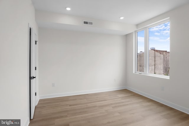 empty room featuring light hardwood / wood-style floors