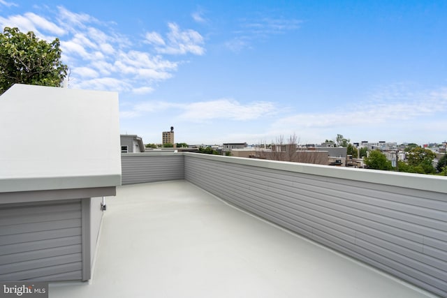 view of patio / terrace with a balcony