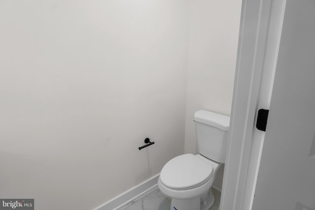 bathroom featuring toilet