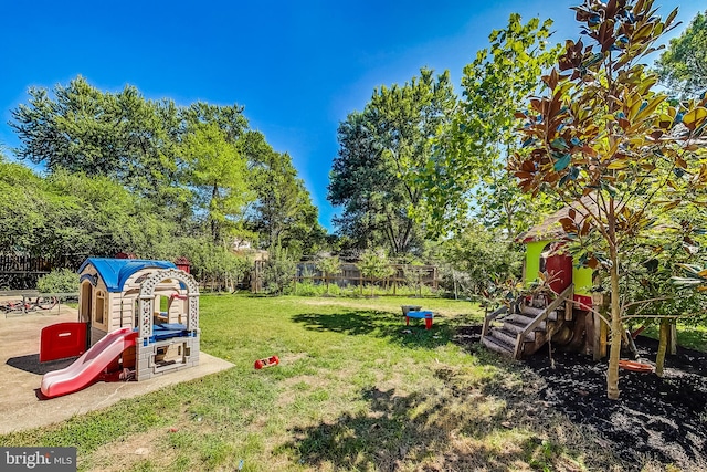 view of yard featuring a playground