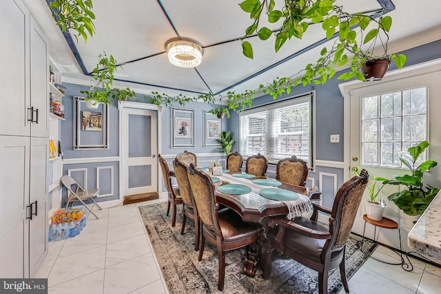 dining area featuring ornamental molding