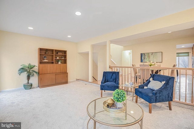 sitting room with carpet flooring