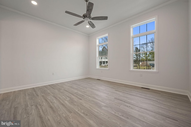 unfurnished room featuring crown molding, ceiling fan, and hardwood / wood-style flooring